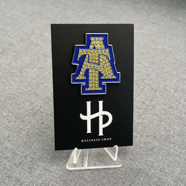 Rhinestone blue and gold A&T interlock lapel pin – Hall Pass HBCU accessories